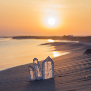 Crystals on a beach at sunset